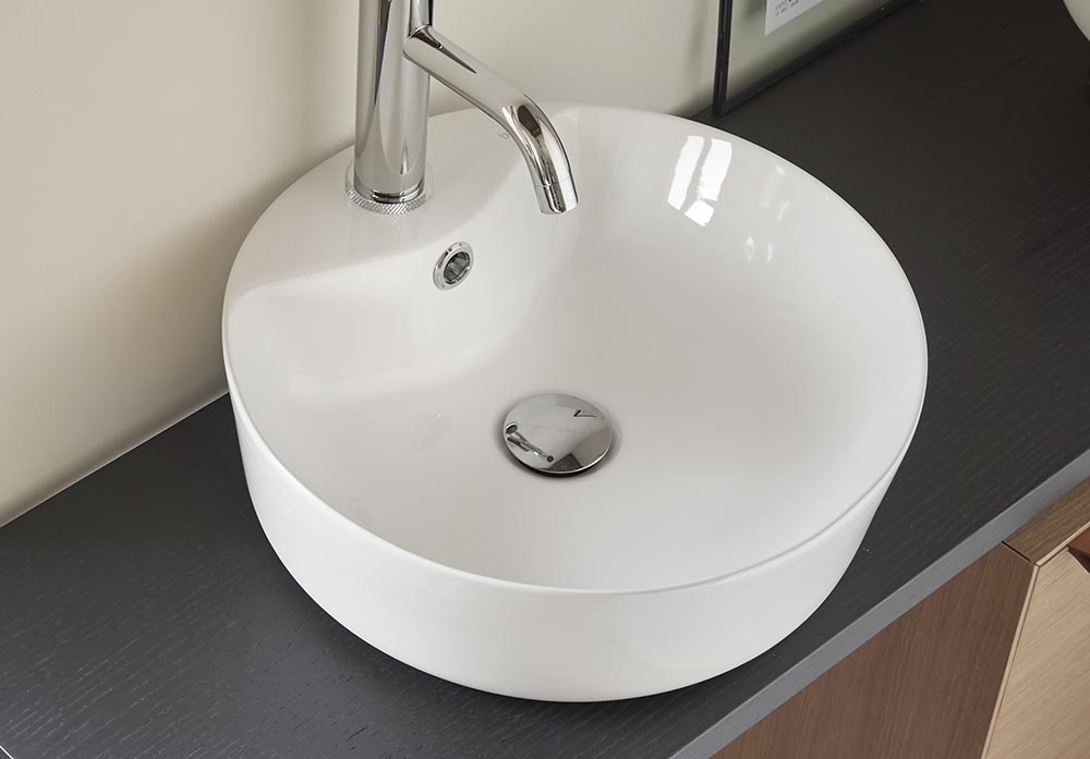 Slotted washbasin pop-up waste green